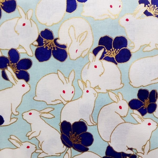 Stoffstück "Goldhasen blau"