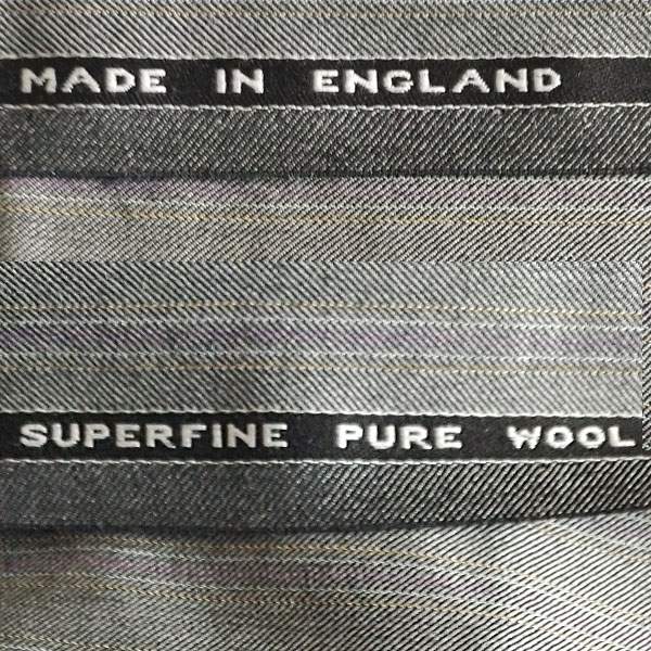 piece of fabric "wool grey-purple-yellow striped" (wool)